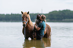 woman with Islandic horse and poodle