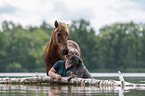 woman with Islandic horse and poodle