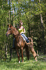 woman with horse an dog