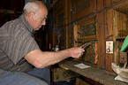 beekeeper with european bees