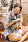 young woman with British Shorthair