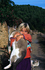girl with domestic cat