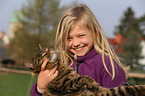 girl and house cat