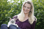 woman with Sacred Birman kitten