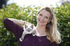 woman with Sacred Birman kitten
