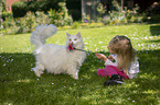 girl with Siberian Cat