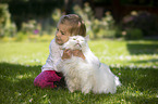 girl with Siberian Cat
