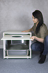 woman with cat litter box