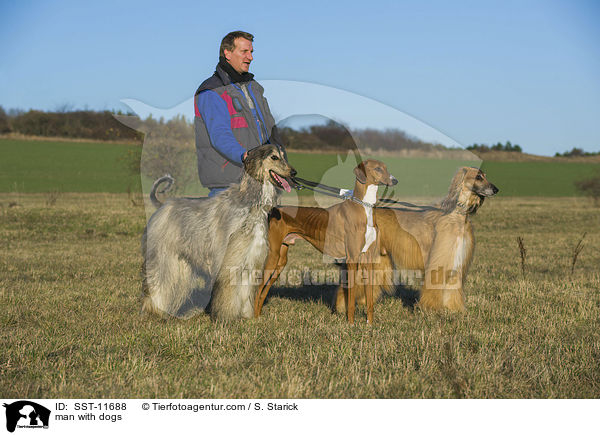 Mann mit Hunden / man with dogs / SST-11688