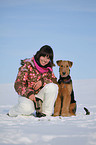 young woman with Airedale Terrier