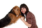 young woman with Airedale Terrier