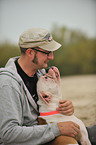 man and American Bulldog