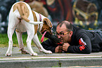 man and American Bulldog