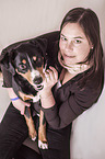 woman and Appenzell Mountain Dog