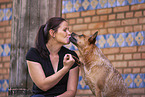 young woman with Australian Cattle Dog