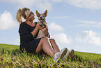 young woman with Australian Cattle Dog puppy