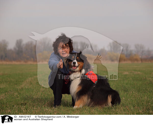 woman and Australian Shepherd / AM-02167