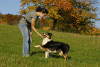 young woman with Australian Shepherd