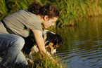 young woman with Australian Shepherd