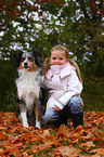 girl and Australian Shepherd