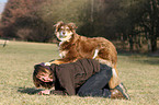 woman and Australian Shepherd