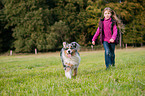 girl with Australian Shepherd