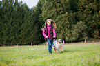 girl with Australian Shepherd