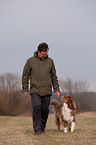 man and Australian Shepherd