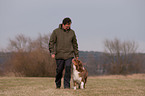man and Australian Shepherd