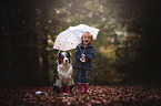 girl and Australian Shepherd