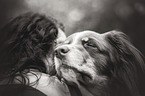 woman with Australian Shepherd