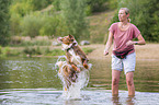woman with Australian Shepherd