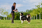 woman with Australian Shepherd