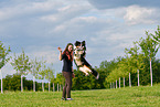 woman with Australian Shepherd
