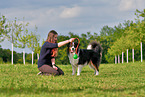 woman with Australian Shepherd