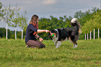 woman with Australian Shepherd