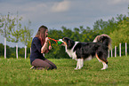 woman with Australian Shepherd