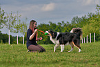 woman with Australian Shepherd