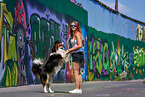 woman with Australian Shepherd
