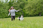 woman with Australian Shepherd