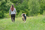 woman with Australian Shepherd