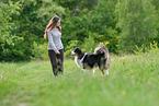 woman with Australian Shepherd