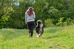 woman with Australian Shepherd