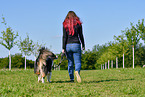 woman with Australian Shepherd