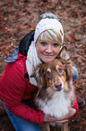 woman and Australian Shepherd