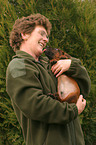 woman with Bavarian Mountain Hound puppy