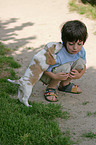 boy with puppy