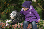 girl with Bearded Collie