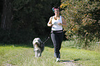 Jogger with Bearded Collie