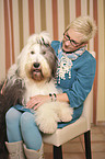 woman and Old English Sheepdog